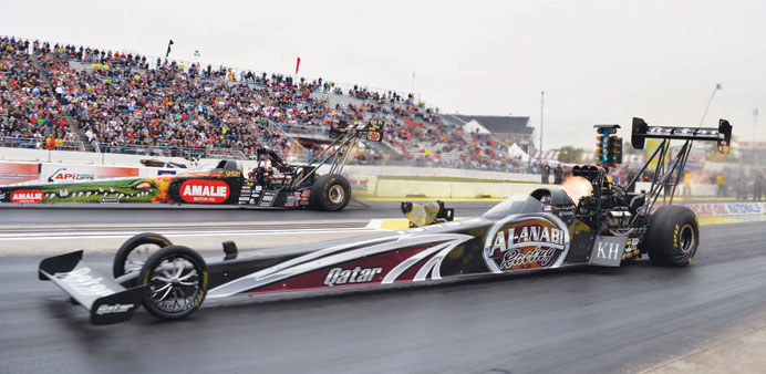 Reigning NHRA Mello Yello Top Fuel world champion Shawn Langdon races to his first-round win against Terry McMillen in Brainerd, Minnesota, on Sunday.