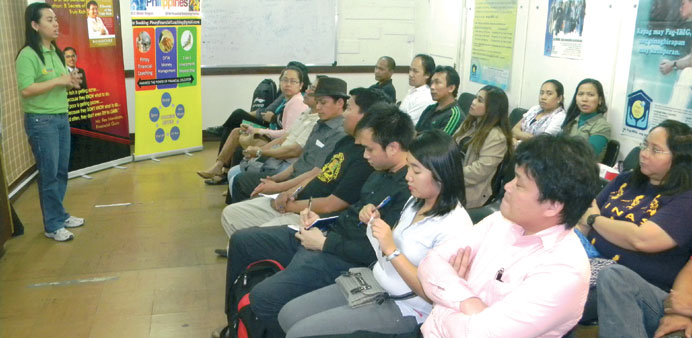  Participants attend a financial literacy programme.